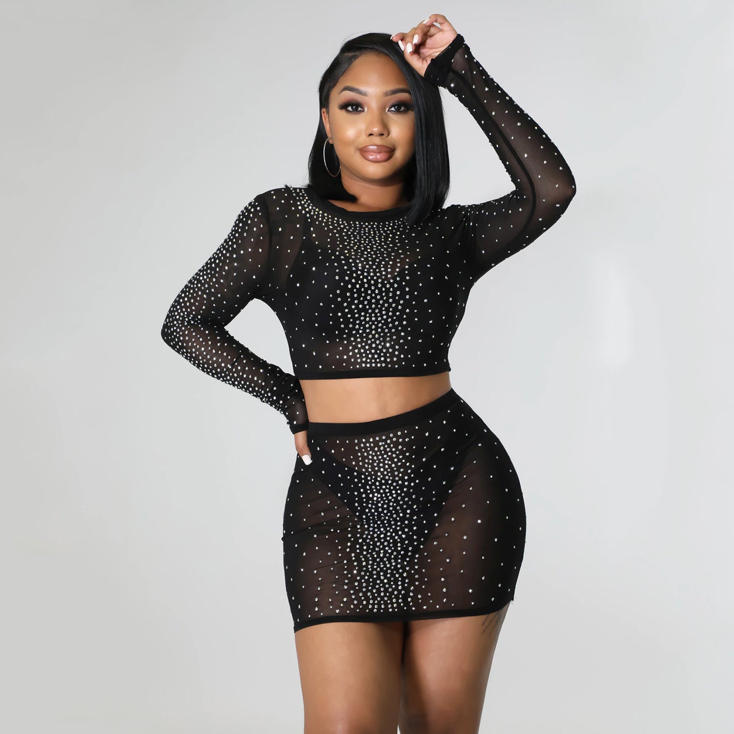 Tenue jupe transparente à manches longues en maille pour femme